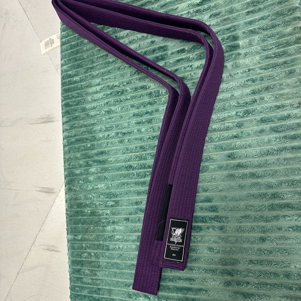New Brazilian Jiu Jitsu purple belt